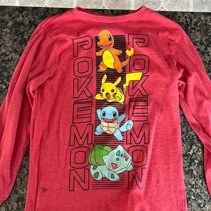 Boys small Pokémon shirt. Small black stain on bottom